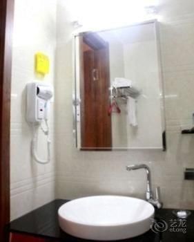 Hualian Business Hotel Шеньян Экстерьер фото